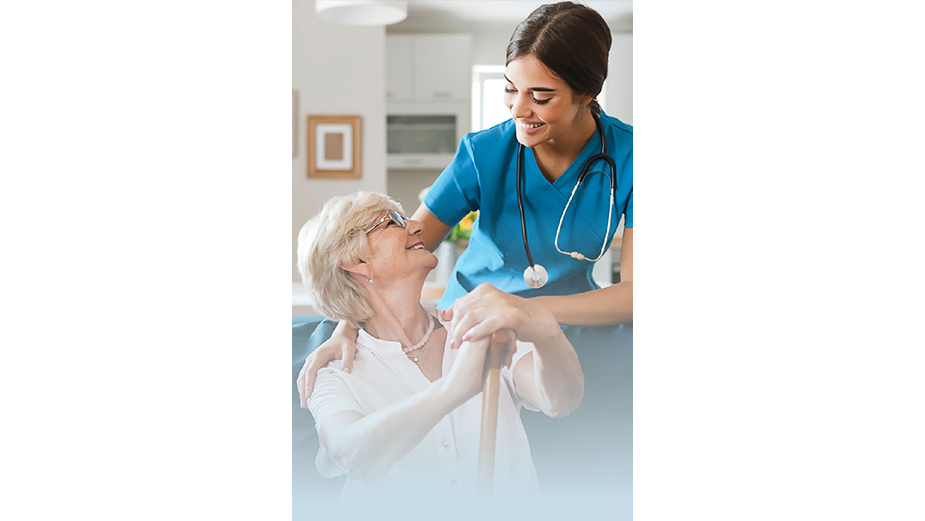 Female caregiver supporting older woman