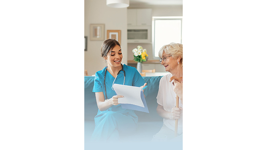 Female caregiver supporting older woman