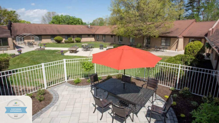 Image of outdoor patio at Harmony Village at CareOne Jackson, an assisted living in Jackson, NJ with comprehensive memory care.