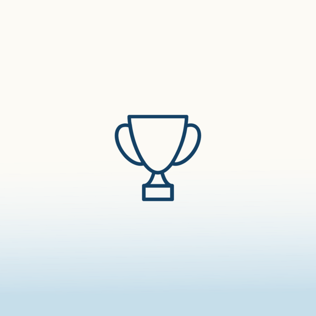 A blue icon of a trophy. Background is white at the top and fades into a light blue at the bottom of the image.